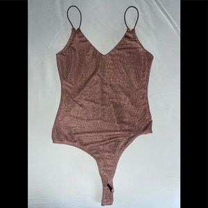 Rose gold bodysuit with light reflective shimmer 😍